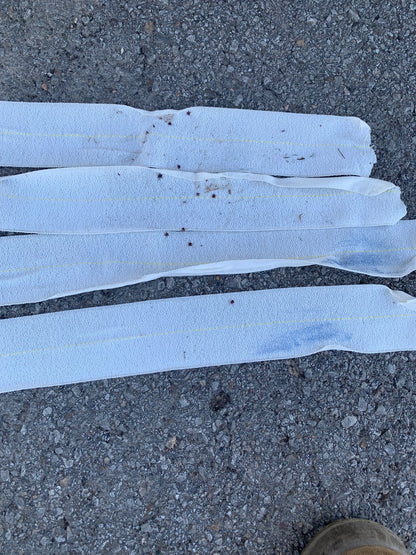 White tick tape wrap showing ticks that have been trapped